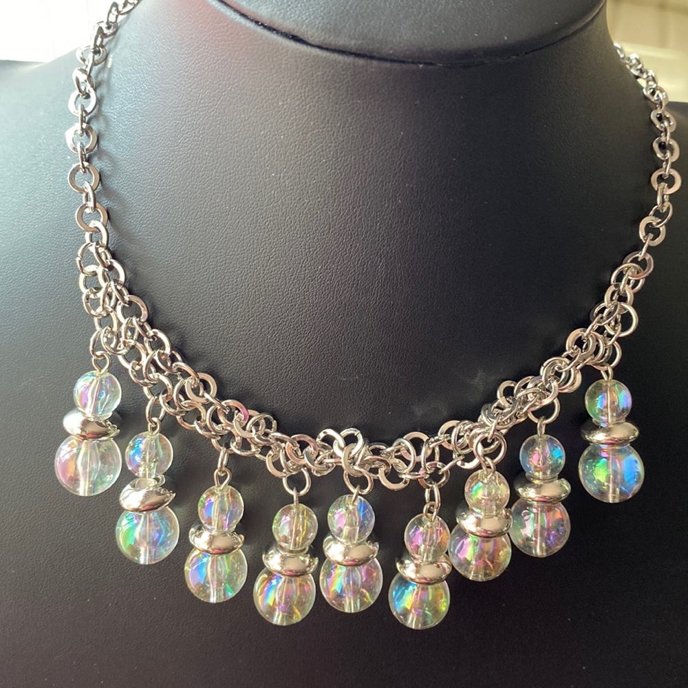 Necklace, earrings and bracelet.